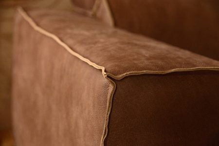 Divano design moderno angolare con poggiatesta reclinabile con relax lineare pelle e tessuto, modello Tomas | Gobbo Salotti